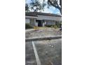 Exterior view of a gated entrance to the pool area with a landscaped walkway at 5162 Puritan Cir # 5162, Tampa, FL 33617