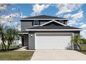 Charming two-story home with a two-car garage and well-maintained landscaping at 1308 22Nd E St, Palmetto, FL 34221
