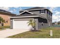 A charming two-story home with a two-car garage and attractive exterior at 1308 22Nd E St, Palmetto, FL 34221