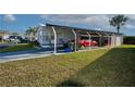 A well-kept carport offers ample parking and storage, adding convenience to this home at 13225 101St St # 462, Largo, FL 33773