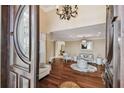 Elegant foyer showcasing hardwood floors and a decorative compass rose inlay at 1336 51St Ne Ave, St Petersburg, FL 33703