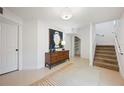 Entryway features tiled floor, stairs, and stylish modern decor at 3010 W Stovall St # B, Tampa, FL 33629