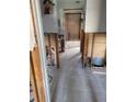 Bathroom and vanity renovation project shows exposed studs and tile flooring at 200 Country Club Dr # 903, Largo, FL 33771