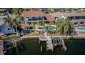 Aerial of back yard, boat dock, and pool at 4937 Dover Ne St, St Petersburg, FL 33703