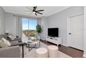 Bright living room with a large window, neutral colors, and sleek, modern furnishings at 700 S Harbour Island Blvd # 738, Tampa, FL 33602