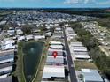 Charming community featuring a tranquil pond and well-maintained streets in a desirable location at 222 N Saint George Cir, Apollo Beach, FL 33572
