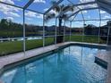 Relaxing screened-in pool with beautiful views of the lake and the neighborhood at 20115 Nob Oak Ave, Tampa, FL 33647