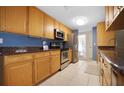 Kitchen featuring stainless steel appliances and wood cabinets at 2084 Whitney Dr, Clearwater, FL 33760