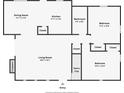 Detailed floor plan showcasing the layout of the home including the kitchen, bedrooms, and living spaces at 2602 Fiddlestick Cir, Lutz, FL 33559