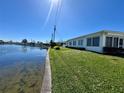 Waterfront property with lush green backyard extending to the calming lake at 10063 40Th N St # 3, Pinellas Park, FL 33782