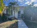 Inviting single-story home with mature landscaping and a welcoming front entrance at 12139 Buffington Ln, Riverview, FL 33579