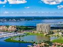 Expansive aerial view of condo community overlooking serene waterfronts and lush landscapes at 130 Riviera Dunes Way # 606, Palmetto, FL 34221