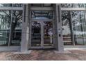 Elegant building entrance with glass doors and sidelights, showcasing a modern and inviting design at 777 N Ashley Dr # 1915, Tampa, FL 33602
