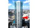 Stunning high-rise building featuring modern architecture, balconies, and beautiful city and water views at 777 N Ashley Dr # 1915, Tampa, FL 33602