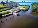 Scenic boat dock with boat, offering waterfront access and serene views of the water at 504 S Florida Ave # 225, Tarpon Springs, FL 34689