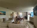 Inviting living room with comfortable seating, open layout, and stylish decor at 5144 Pine Tree Ln, Wesley Chapel, FL 33543