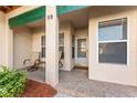 Cozy front porch with seating and views, creating an inviting entrance to the home at 6311 99Th N Way # 11B, St Petersburg, FL 33708