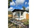 Charming home with a tidy front yard and a welcoming entrance at 3623 N 53Rd St, Tampa, FL 33619