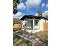 Charming home with a tidy front yard and a welcoming entrance at 3623 N 53Rd St, Tampa, FL 33619