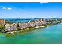 Waterfront condos with a private beach, scenic landscaping, and beautiful bay views at 4981 Bacopa S Ln # 103, St Petersburg, FL 33715