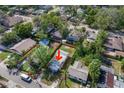 Birds eye view of a residential area featuring tree-lined streets and tidy single-Gathering homes at 8308 N Mulberry St, Tampa, FL 33604