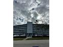 A multi-story condo building, boasting a clean, modern design and a well-maintained facade at 1868 Shore S Dr # 608, South Pasadena, FL 33707