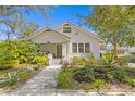 Charming home with a beautifully landscaped front yard and inviting curb appeal at 2721 12Th N St, St Petersburg, FL 33704