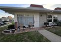 Inviting condo exterior with a charming patio area, perfect for relaxation at 4355 Tahitian Gardens Cir # D, Holiday, FL 34691