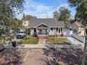 Charming single-Gathering home with a landscaped yard, driveway, brick steps, and inviting front porch at 951 9Th S Ave, St Petersburg, FL 33705