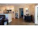 Open-concept living space with dining area and modern kitchen at 104 Gloucester Blvd # 340, Sun City Center, FL 33573