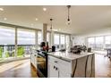 Bright, open kitchen with modern appliances, marble island, and beautiful views at 400 Island Way # 612, Clearwater Beach, FL 33767
