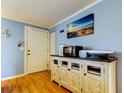 Charming entryway with a stylish cabinet and a welcoming decor at 136 Sycamore Ln # C, Oldsmar, FL 34677