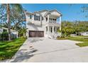 Beautiful two-story home with a spacious driveway and well-maintained lawn at 3201 S Manhattan Ave, Tampa, FL 33629