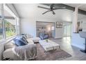 Bright living room featuring modern decor, neutral color palette, and ample natural light at 3820 E Lakeshore Dr, Tampa, FL 33604