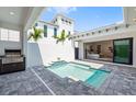 Beautiful pool with a built in grill area and seamless access to the bedroom through sliding glass doors, perfect for relaxing at 5932 Red Mangrove Ln, Bradenton, FL 34210