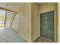 This image features a condo entryway and a staircase leading to the upper floors at 17108 Carrington Park Dr # 701, Tampa, FL 33647