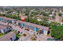 Condo complex featuring well-maintained landscaping and ample parking for residents and visitors at 2113 Canal Dr # B2, Bradenton, FL 34207