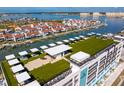 Rooftop amenities include shaded outdoor seating with bay view at 400 150Th Ave # 206, Madeira Beach, FL 33708