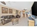 The interior showcases a comfortable living area with tile floors and stylish furnishings at 6268 Palma Del Mar S Blvd # 113, St Petersburg, FL 33715
