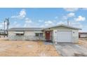 Charming one-story home featuring a single-car garage, manicured lawn, and freshly painted exterior at 1118 Excalibur St, Holiday, FL 34690