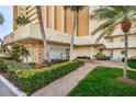 Exterior view of the community center, with well-maintained landscaping at 4525 Cove Cir # 705, St Petersburg, FL 33708