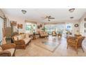 Comfortable community center seating area with abundant natural light and tile flooring at 4525 Cove Cir # 705, St Petersburg, FL 33708