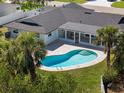A beautiful pool is attached to the home with a large backyard at 4568 40Th S St, St Petersburg, FL 33711