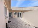A private patio offering a serene outdoor space for relaxation and entertainment at 673 Boca Ciega Point N Blvd, St Petersburg, FL 33708