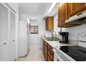 Kitchen featuring a view, and bright lighting at 808 Bahia Del Sol Dr # 14, Ruskin, FL 33570