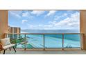 Beautiful view from the balcony overlooking the beach, pool, and building at 880 Mandalay Ave # N907, Clearwater Beach, FL 33767