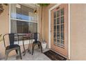Cozy front porch with seating area, perfect for enjoying the outdoors at 10405 Villa View Cir # 10405, Tampa, FL 33647