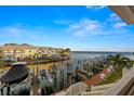 Scenic waterfront view of boat docks with jet skis and boats on lifts at 5202 Beach Se Dr # C, St Petersburg, FL 33705