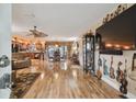Spacious living room featuring wood floors and an open floor plan at 1508 Cascade Ct, Dunedin, FL 34698