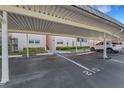 Assigned carport parking with building access at 210 Fernwood Cir # 210, Seminole, FL 33777